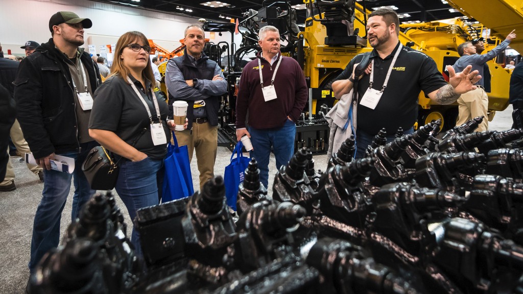 Patrons enjoying a display at World of Asphalt