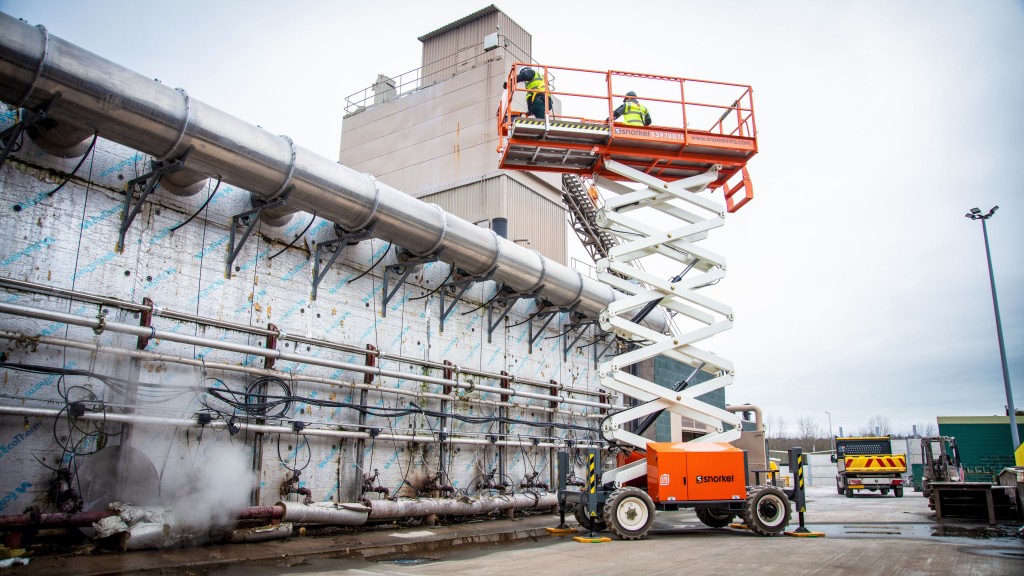 An extended Snorkel rough terrain scissor lift