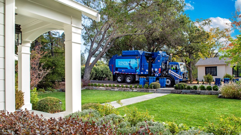 A collection truck collects waste and recyclables