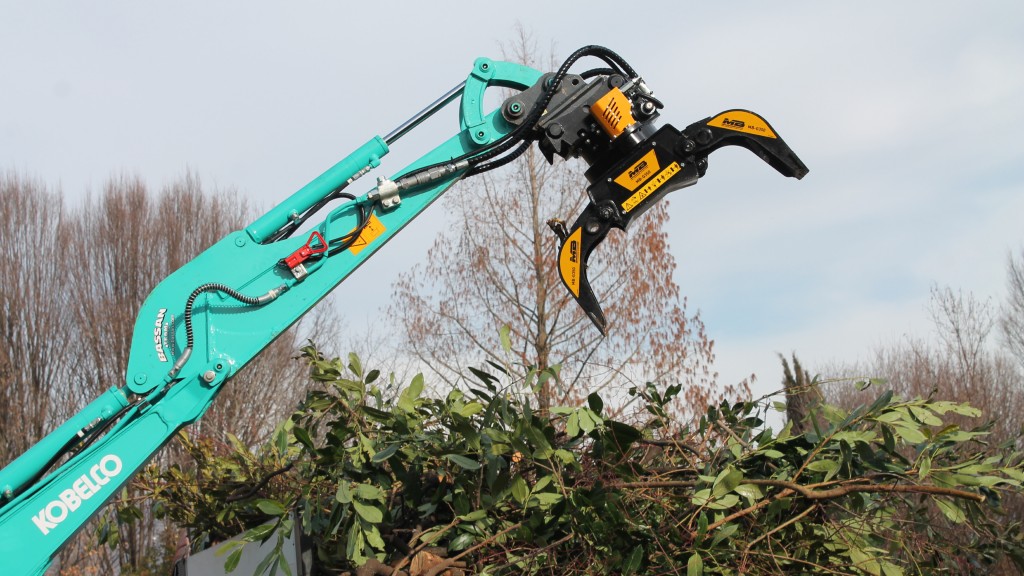 An MB Crusher grapple attached to a Kobelco excavator