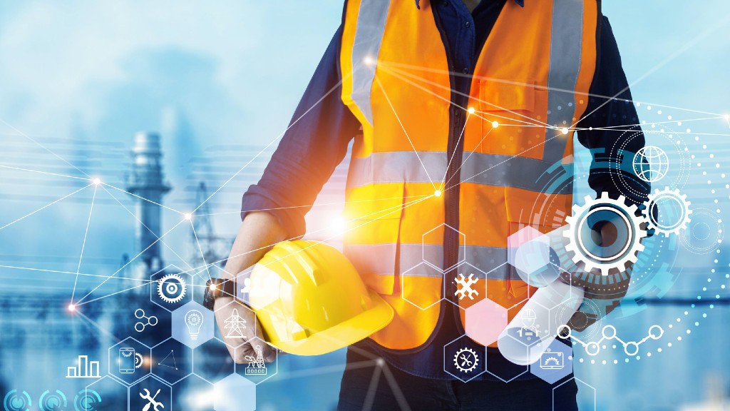 Worker in hi-vis vest among smart technology images