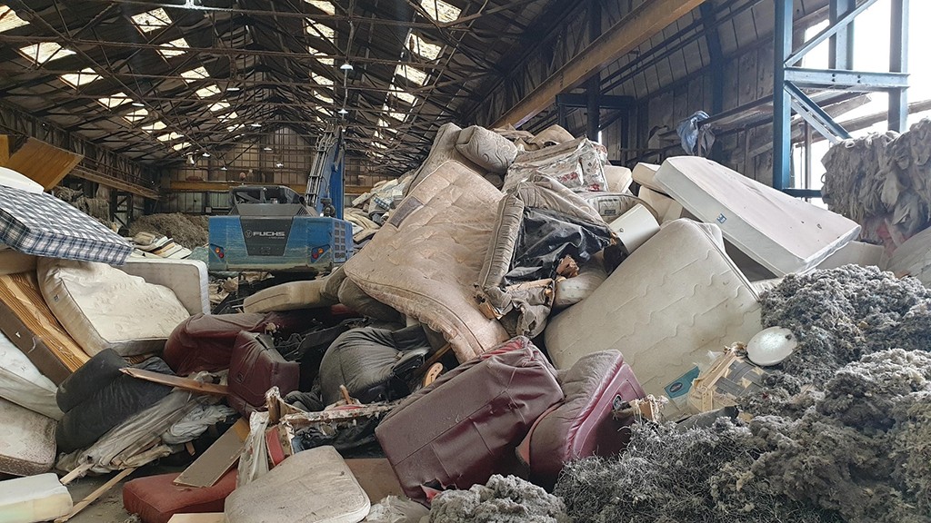 Pile of mattresses for recycling