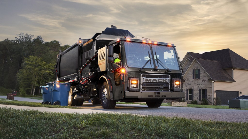 A Mack LR Electric collecting curbside waste