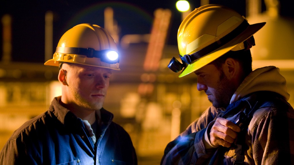 Workers wearing headlamps on the job site Workers wearing headlamps on the job site