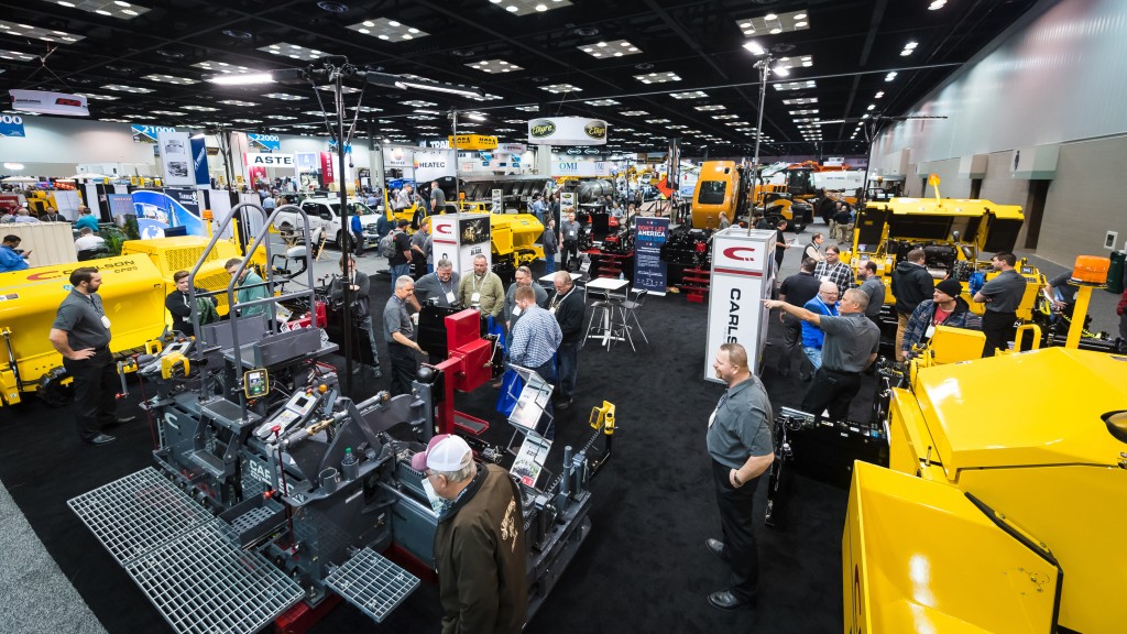 Patrons walk and interact around the World of Asphalt show floor