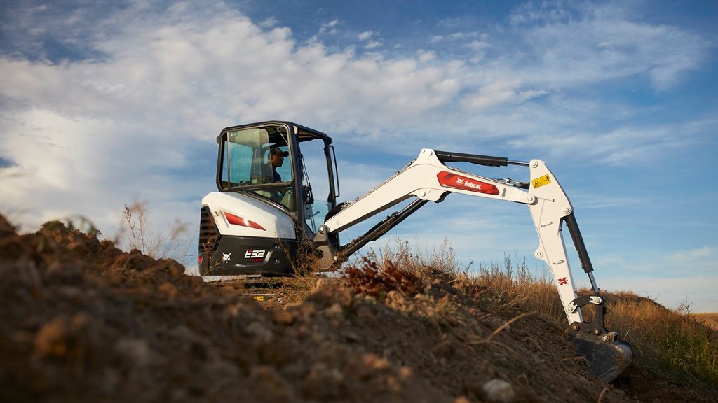 An E32 compact excavator on the job site