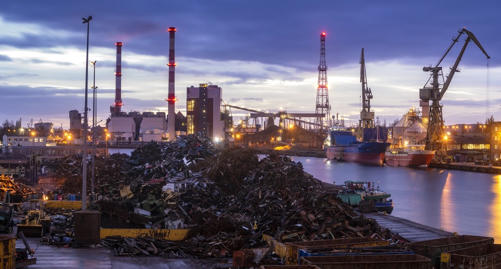 A pile of scrap near a port