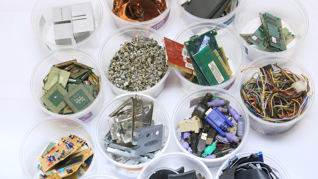 Sorted e-waste stored in clear plastic bins