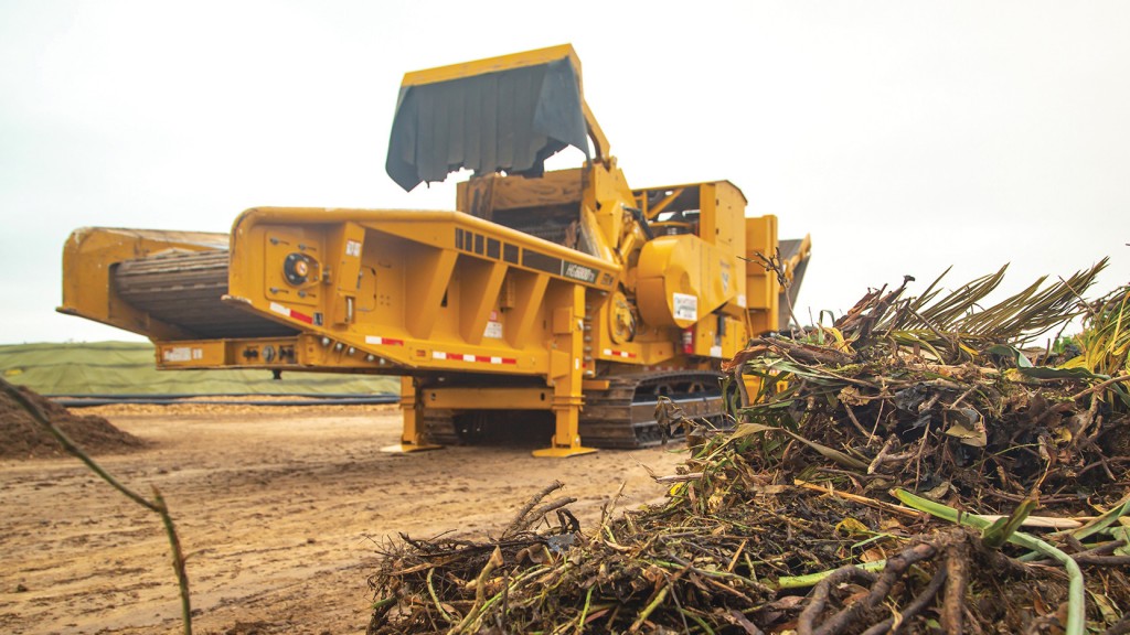 Wood waste about to be put into a horizontal grinder