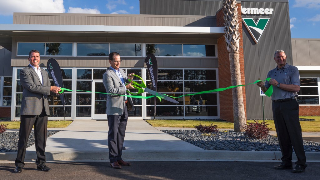 A ribbon cutting event celebrates a Vermeer facility opening