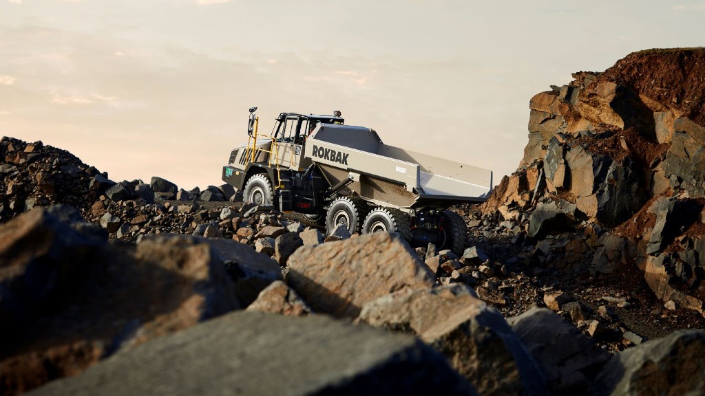 A Rokbak articulated hauler travels on a gravel road