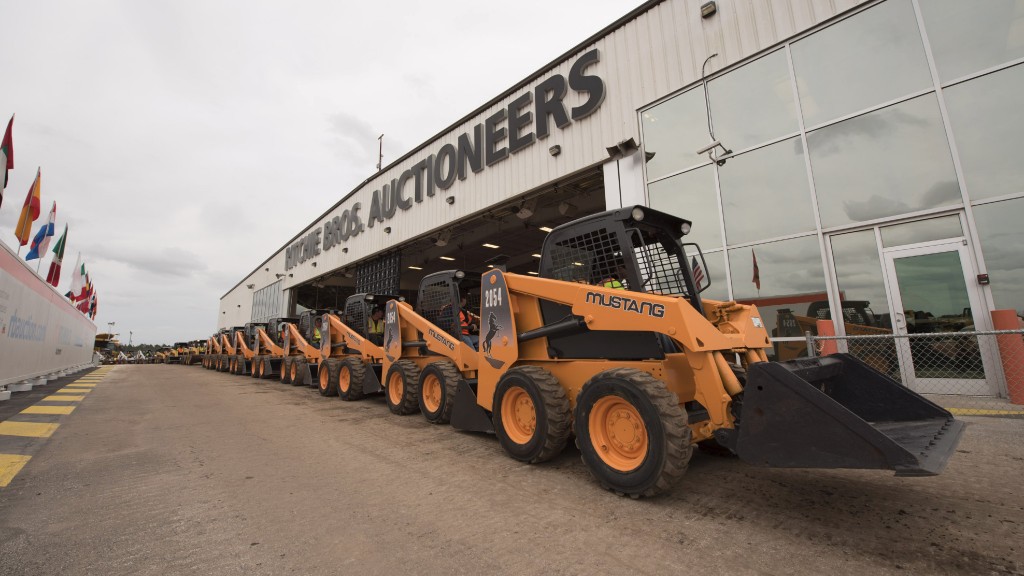Compact track loaders parked at a Ritchie Bros. auction