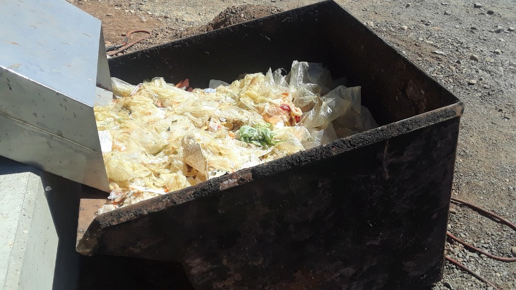 Plastic food packaging waste in a bin