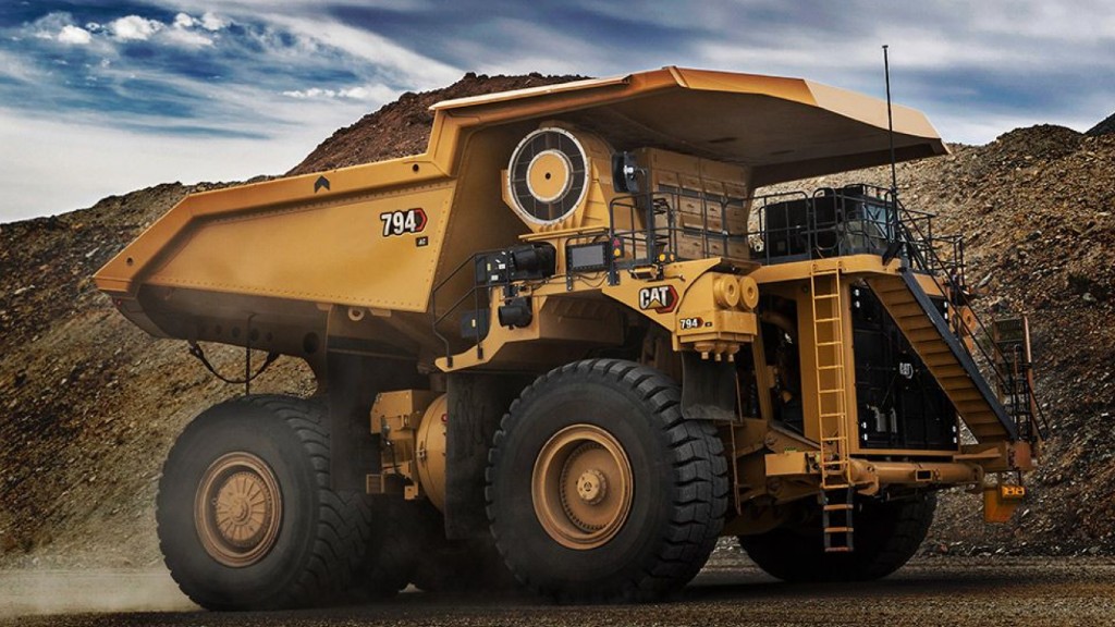 A mining truck hauling a load on a job site