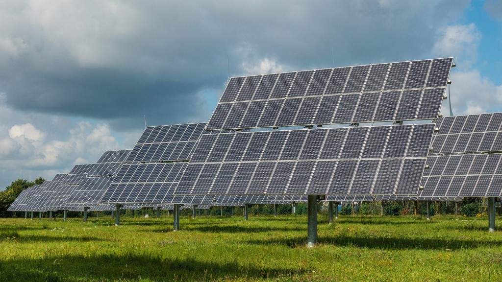 Several arrays of solar panels in a field
