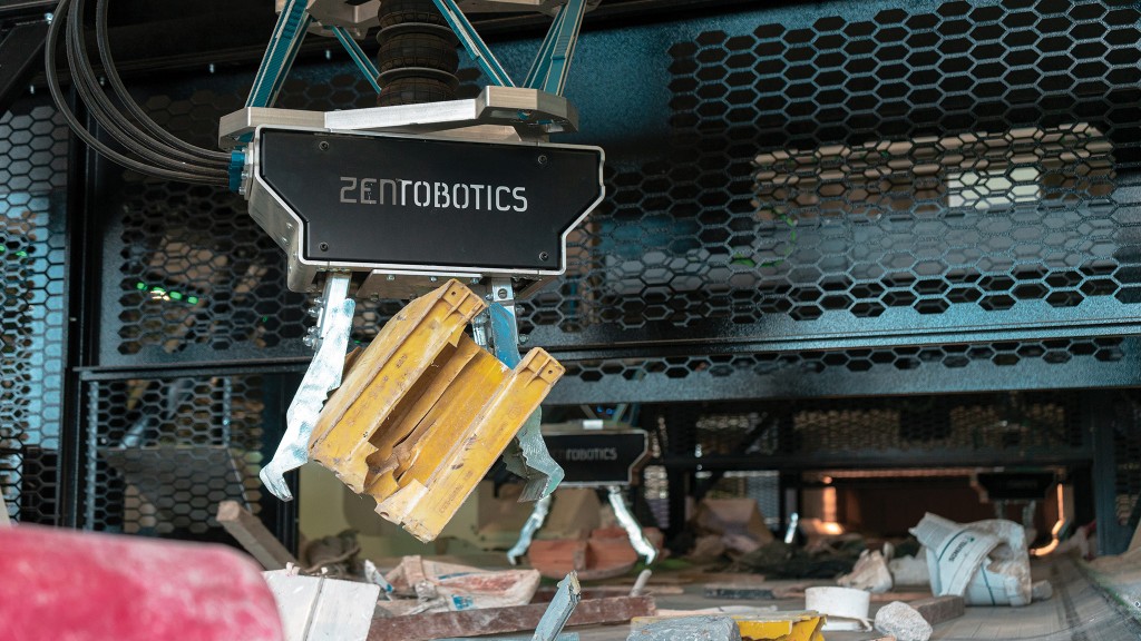 A robotic sorter picks waste from a conveyor