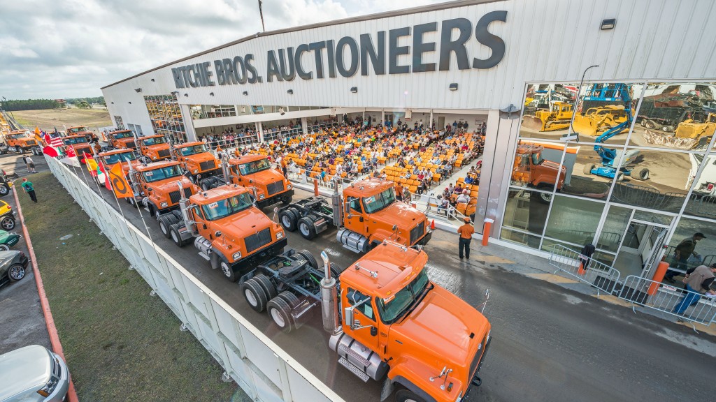 Trucks being sold at an auction