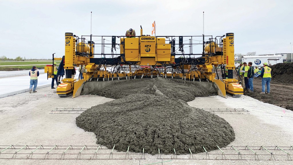 A GOMACO slipform paver laying concrete