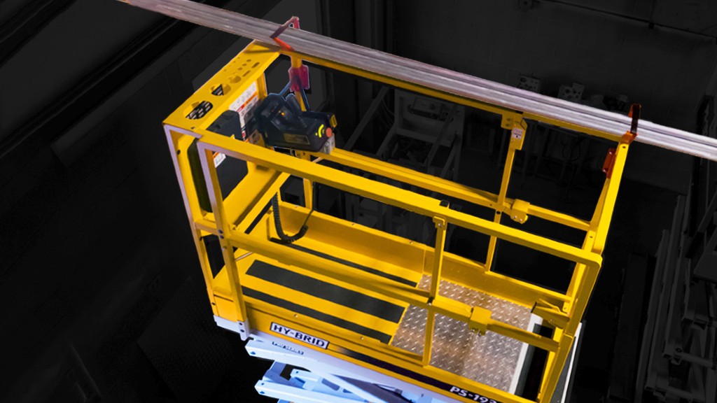 A pipe rack attachment sits on a scissor lift