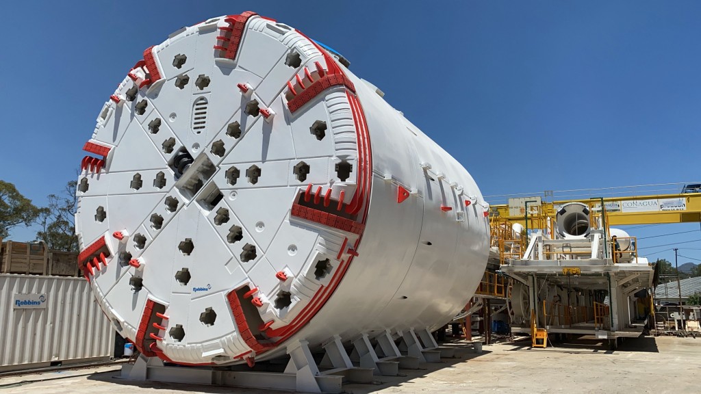 A red and white tunnel boring machine