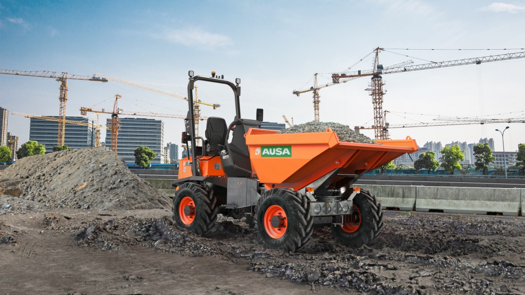 A dumper is parked on a job site with a full skip