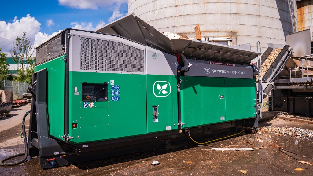 A shredder shreds organic waste on a job site