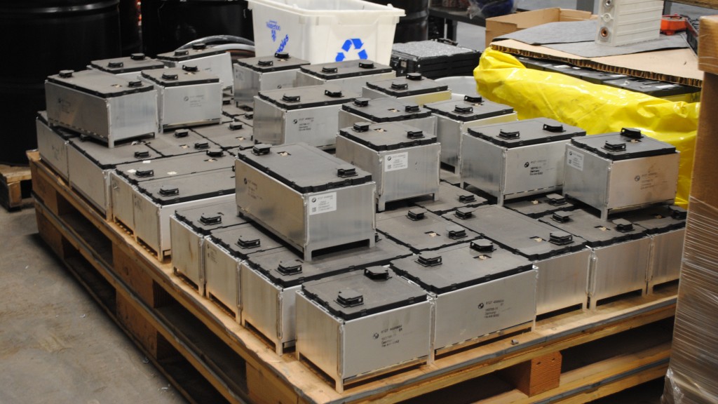 Lithium-ion batteries are stacked in a pile