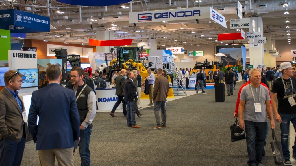 People mill about a trade show floor