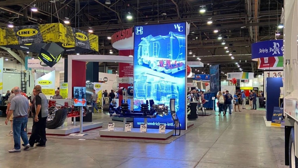 People mill around a trade show floor