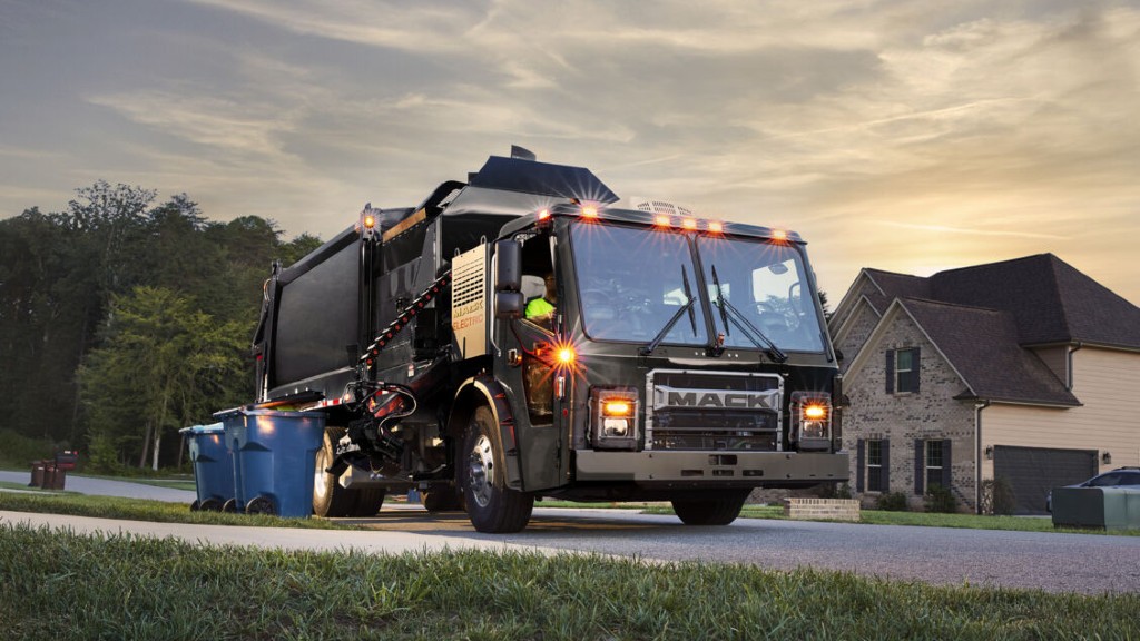 An electric truck collects curbside waste