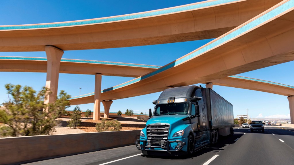 An autonomous truck drives on a highway