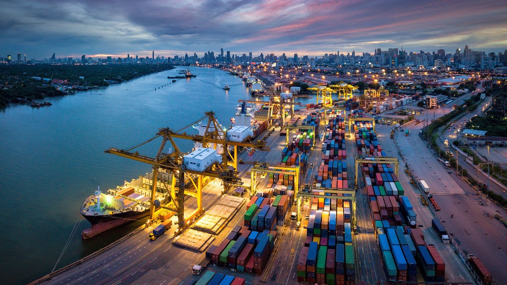 A port at night is full of shipping containers