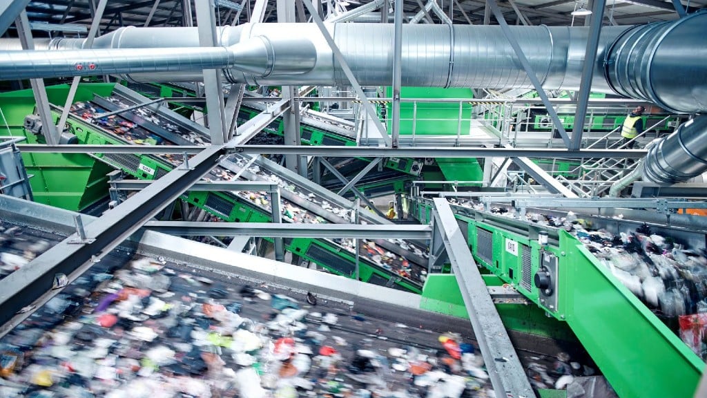 Mixed plastic moves down a conveyor