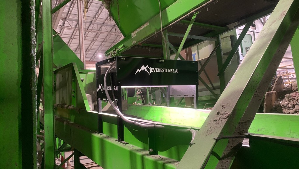 A robotic sorting machine operates at an MRF