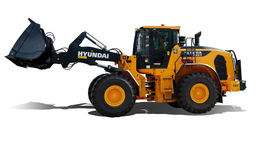 A wheel loader on a white background