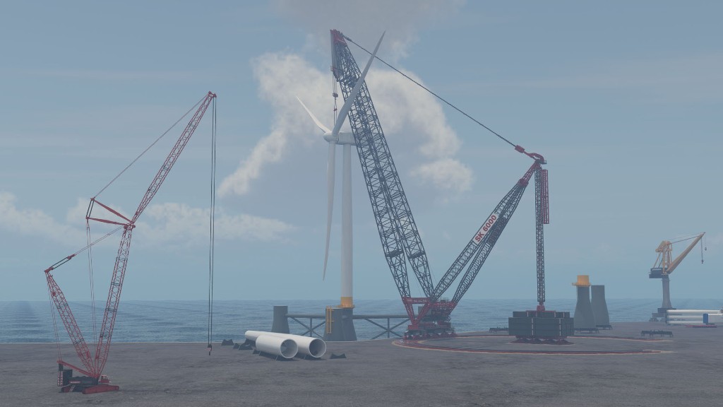 A crane is in operation setting up a wind farm