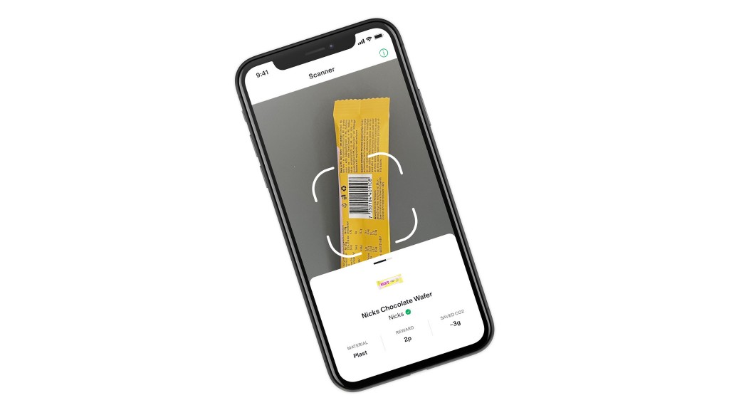 A phone scans a piece of plastic packaging
