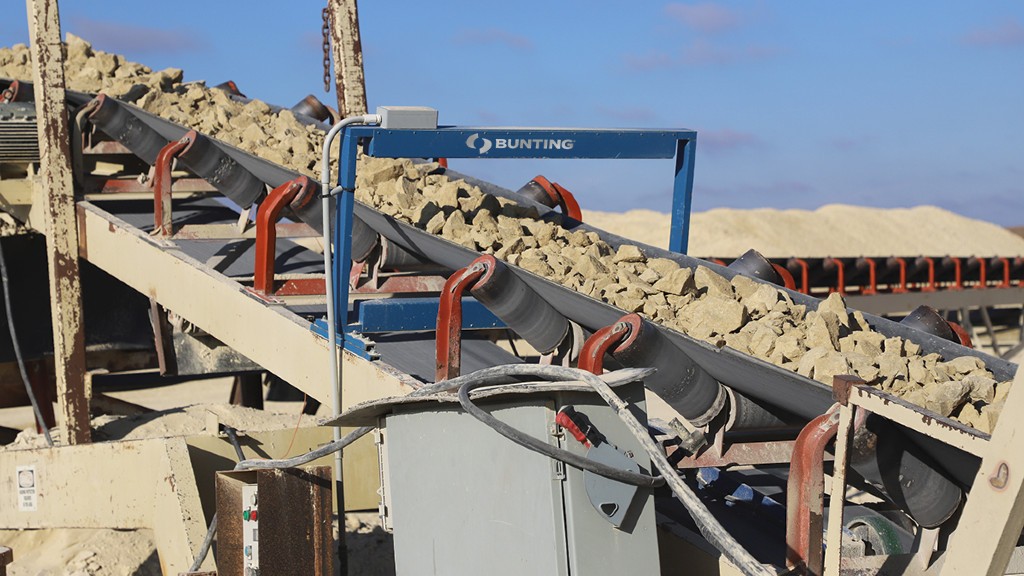 A metal detector operates on a job site