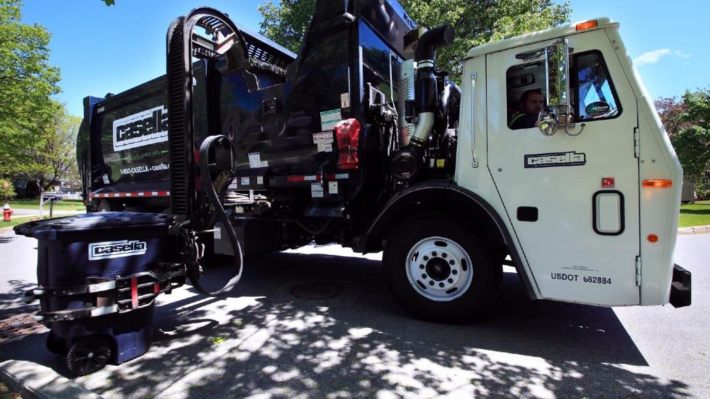 A collection vehicle collects curbside waste