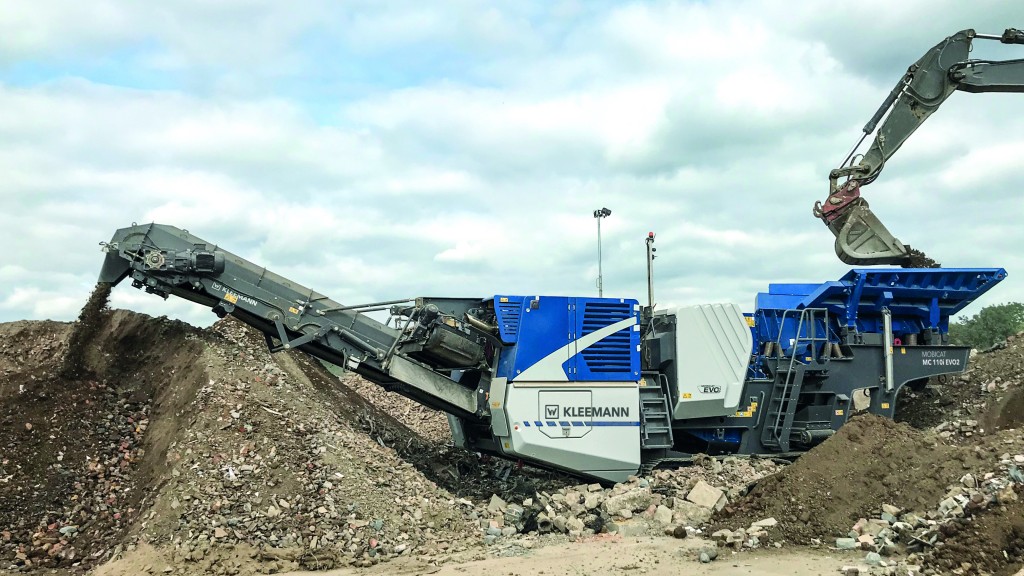 A jaw crusher crushers material on a job site