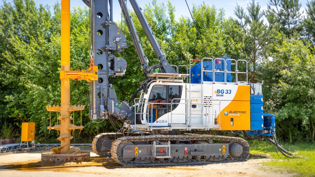 A drilling rig is parked on a job site