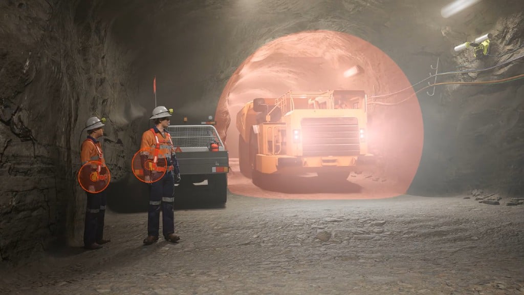 A yellow digital bubble surrounds a piece of underground mining equipment
