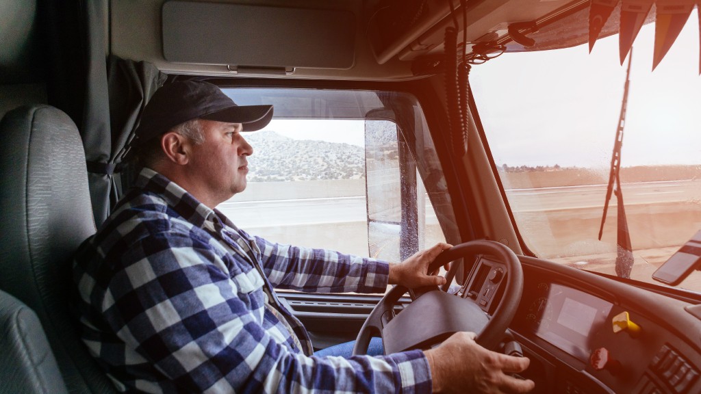 A driver pays attention to the road while driving a large truck