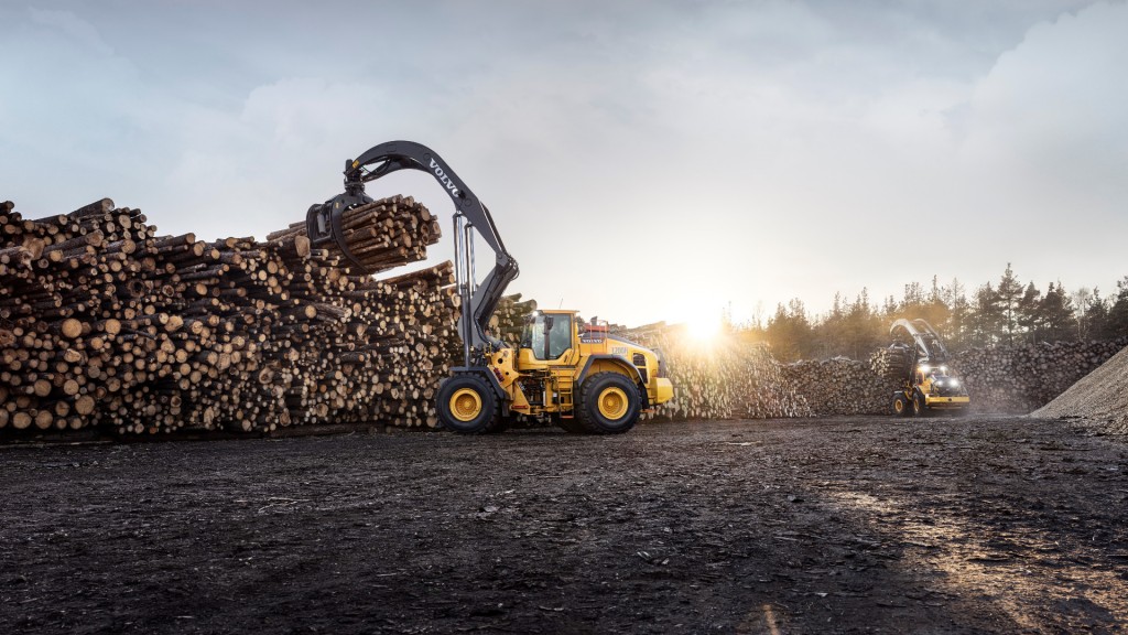 A wheel loader operates on a logging site