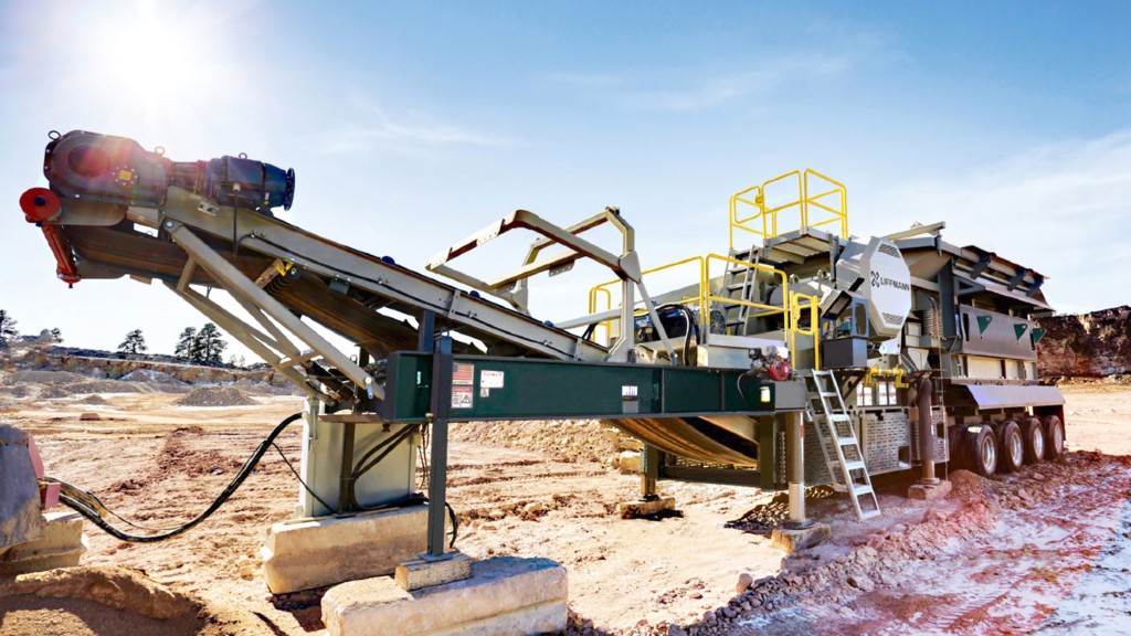 A jaw crusher crushes material on a job site