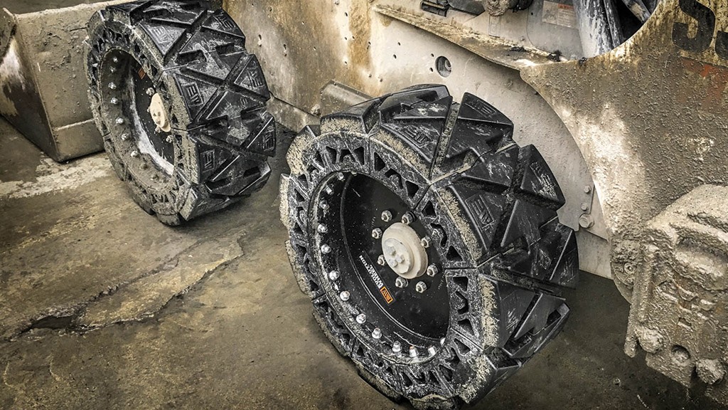 A close-up view of wheels on a piece of equipment