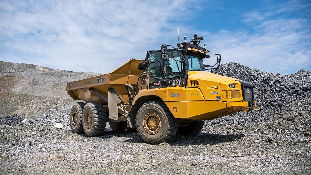 An articulated dump truck is parked on a job site