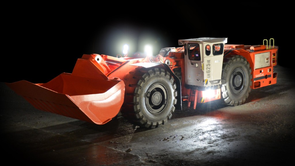 An electric loader operates underground