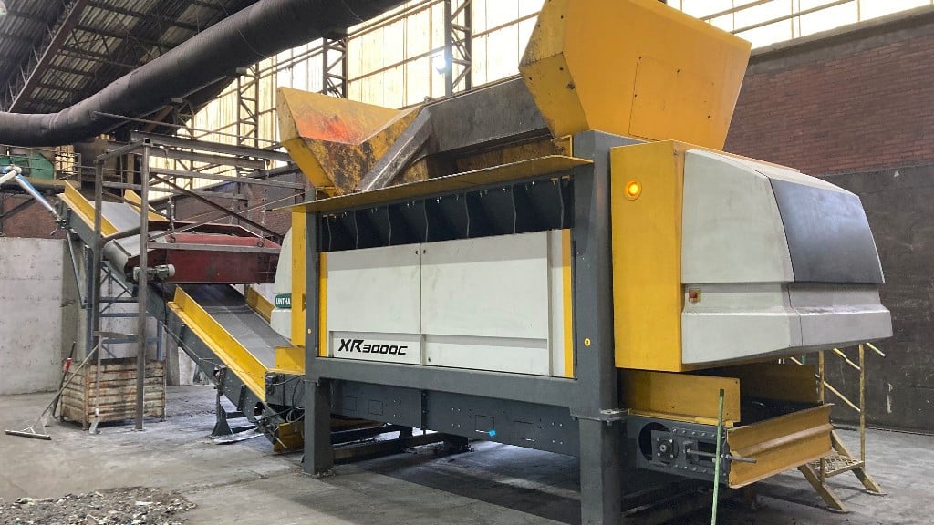 A shredder operates in an RDF facility