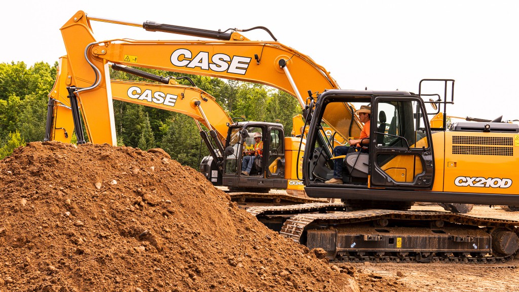 Several excavators are being operated on a job site